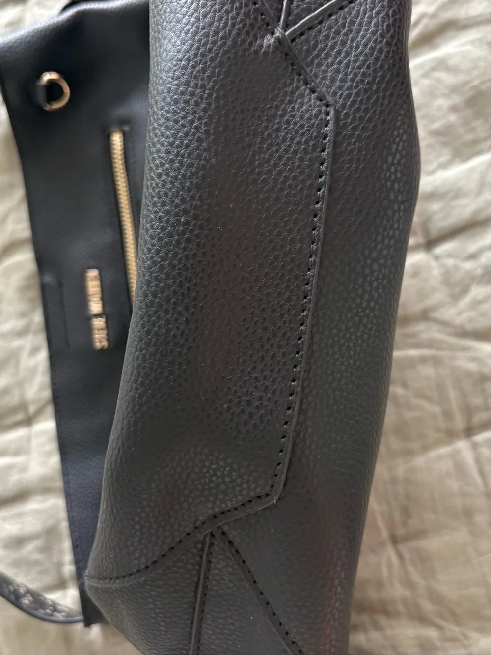 Steve Madden Black Shoulder Bag with “Peekaboo” Snake-Print Strap